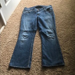 Woman’s silver jeans